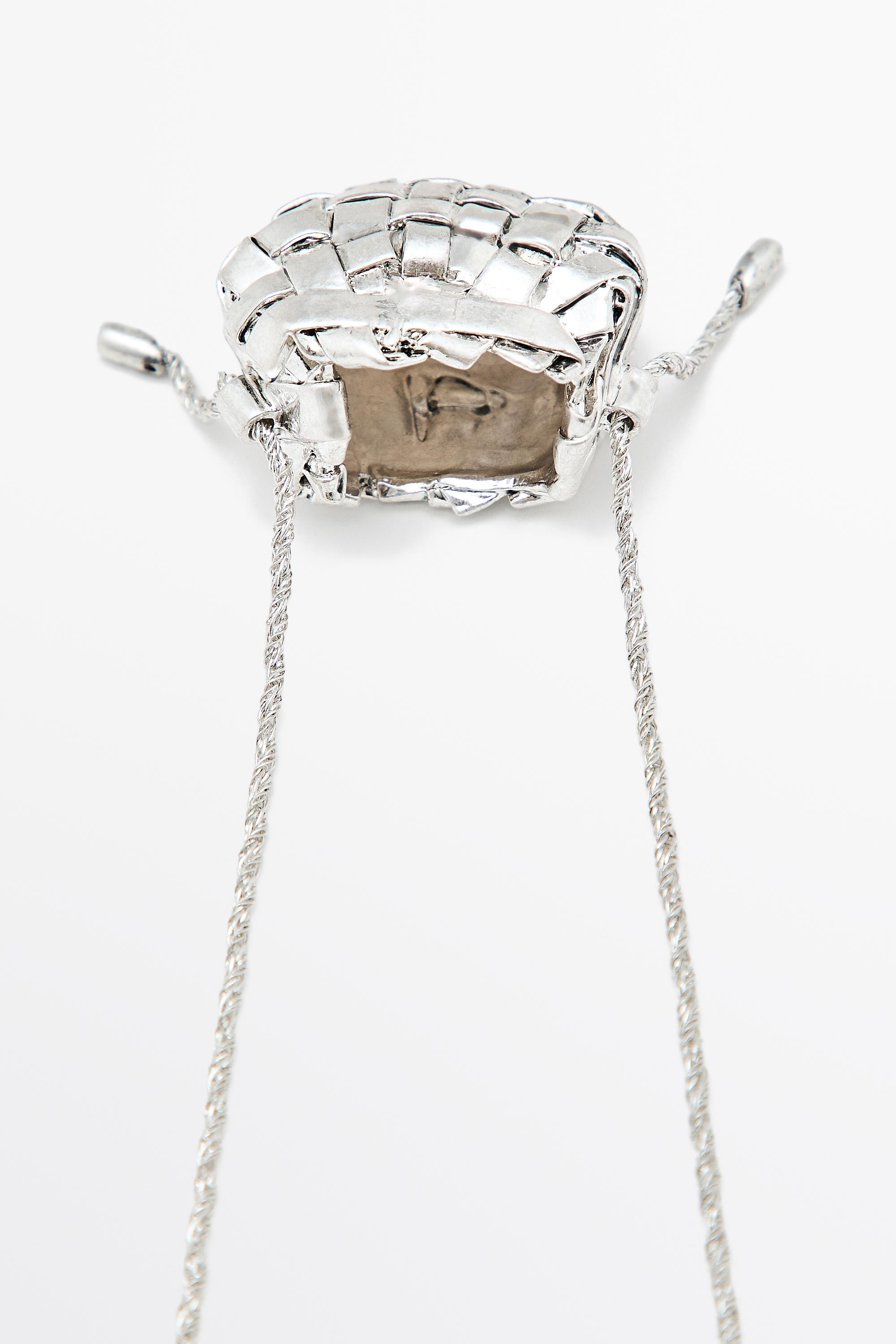 Collier long pièce panier